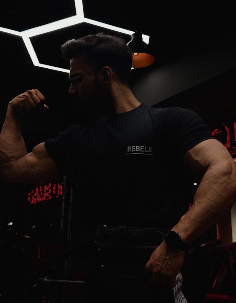 Slthrs tee in the gym